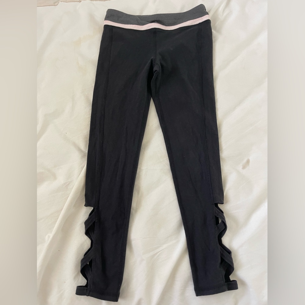 Ideology black leggings with pink waistline and ankle cutouts